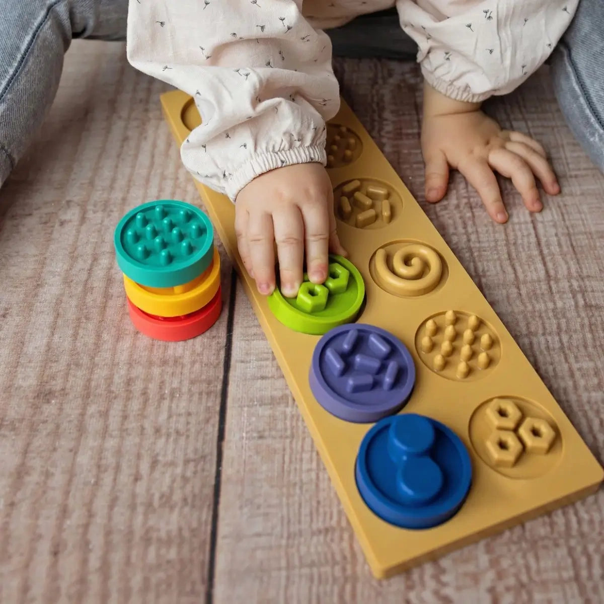 Puzzle sensoryczne kółeczka XL 6 el., od 6 mies.